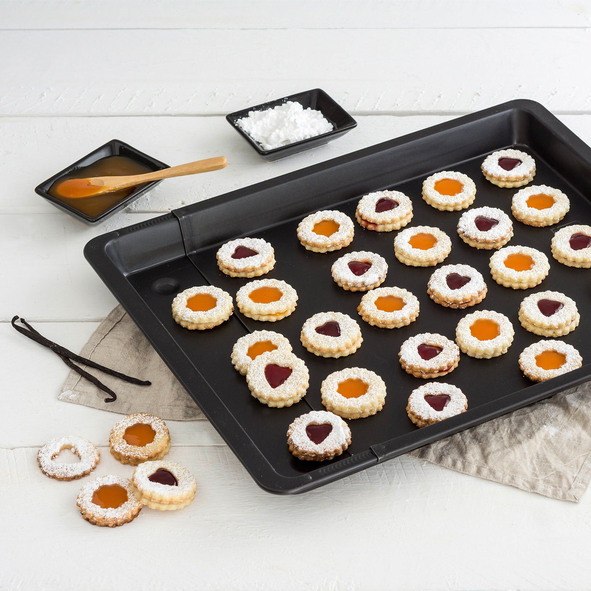 Rozsuwana blaszka do pieczenia z wysokim brzegiem - idealna do pizzy i ciast